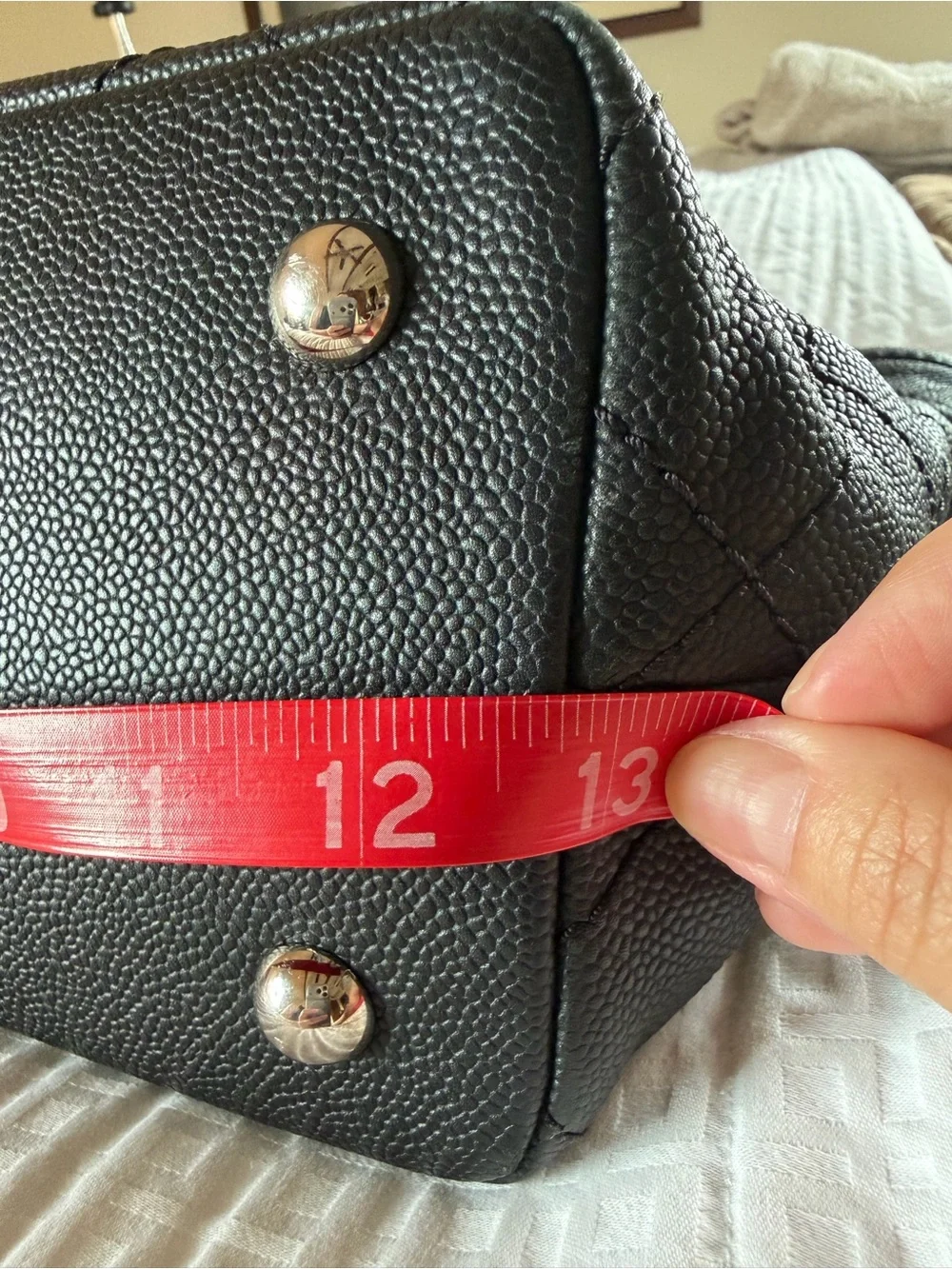 Chanel Black Caviar Leather Shopper Tote with pouch.